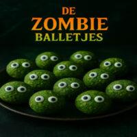 De Zombie Balletjes - Halloween Snack 8 Groene energieballetjes met een vleugje kokos en pistache, bedekt met eetbare oogjes en een griezelige glans. Gezond, eng én onweerstaanbaar — perfect voor elk Halloween-feest!