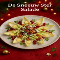 Een frisse, elegante salade met witlof, appel, blauwe kaas en walnoten, mooi gepresenteerd in de vorm van een sneeuwster. De honing-citroendressing geeft een zachte, feestelijke balans tussen fris en romig.