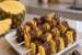 Ananas spiesjes met chocolade en kokos topping